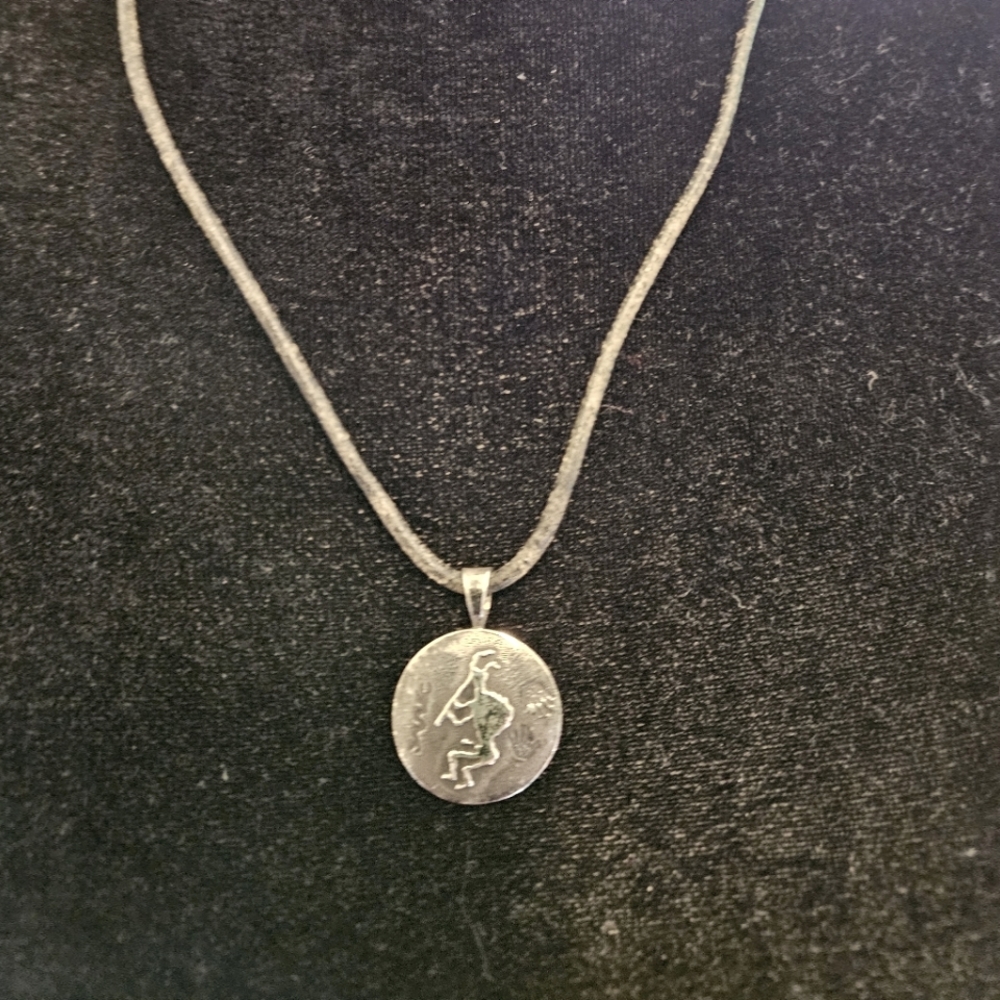 sterling silver on leather kokopelli necklace